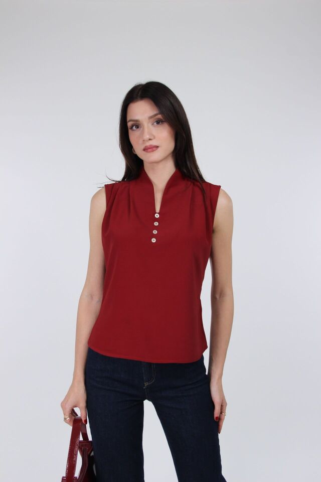 Kadın Düğme Detaylı Kolsuz Bluz – V Yaka Şık ve Rahat Üst